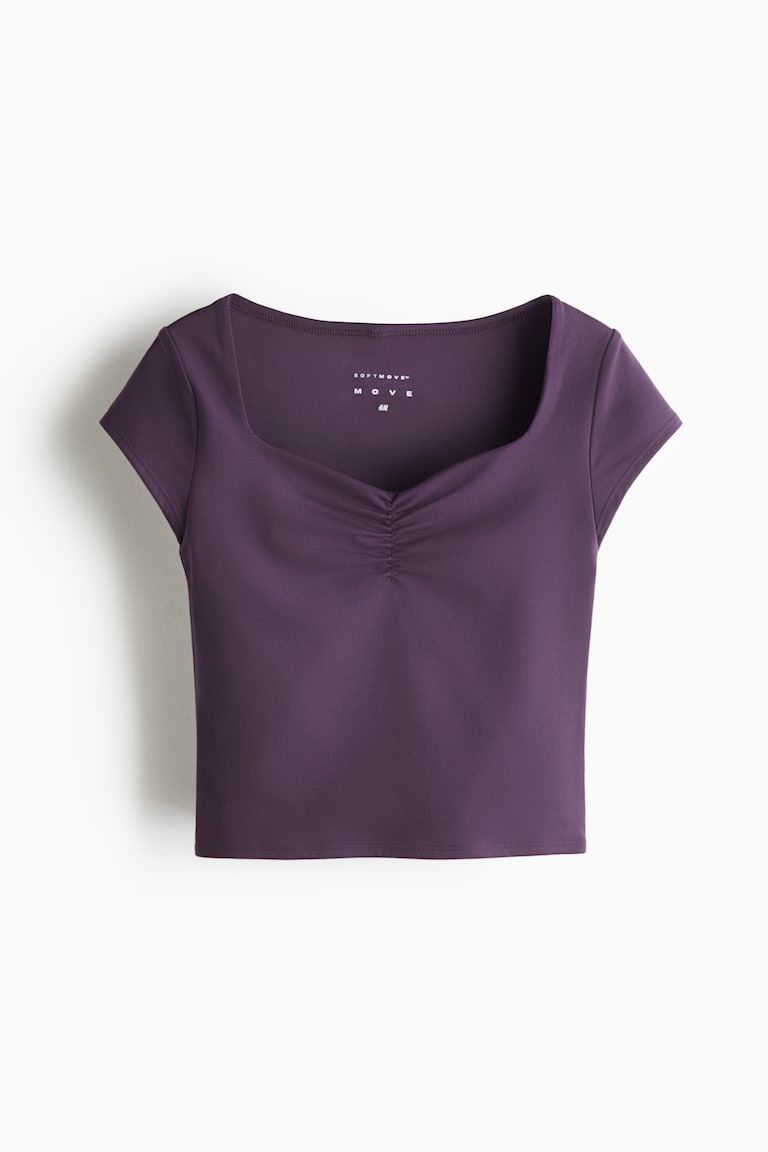 Cropped sports top with SoftMove™