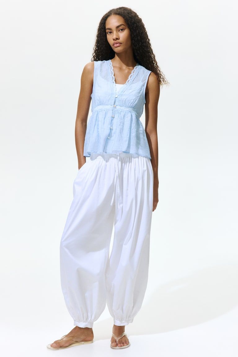 Lace-Trimmed Peplum Top