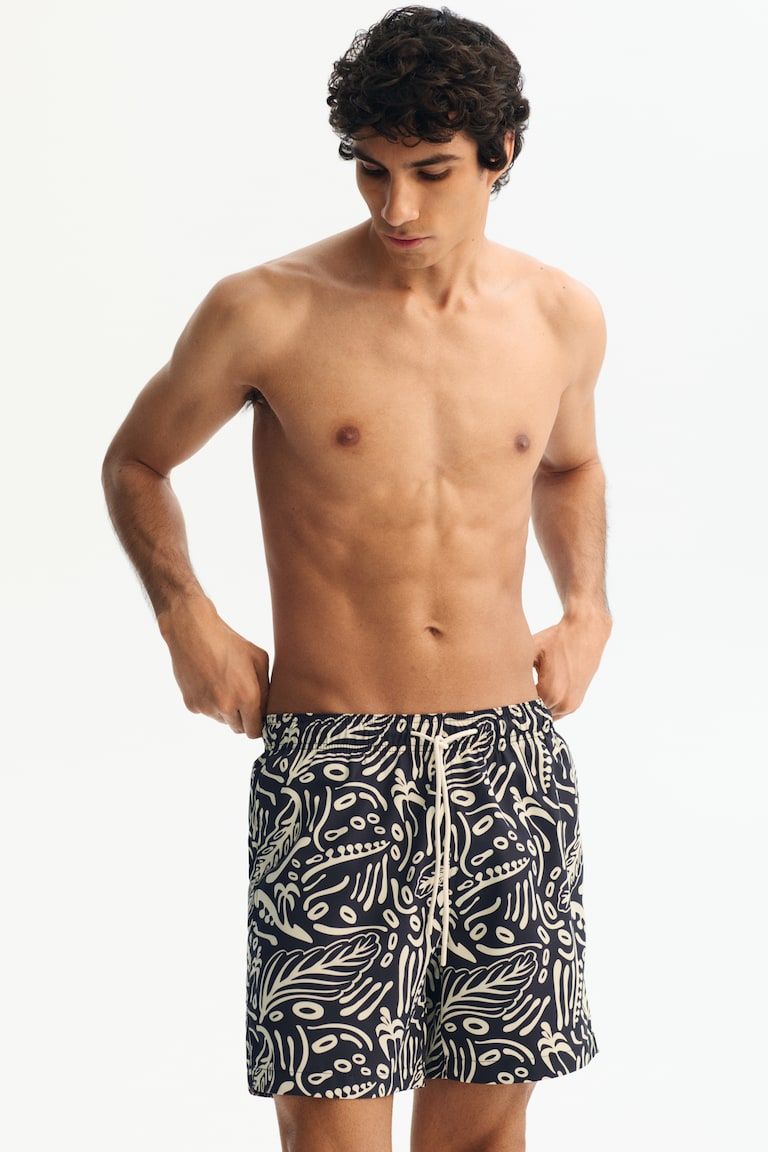 Patterned swim shorts