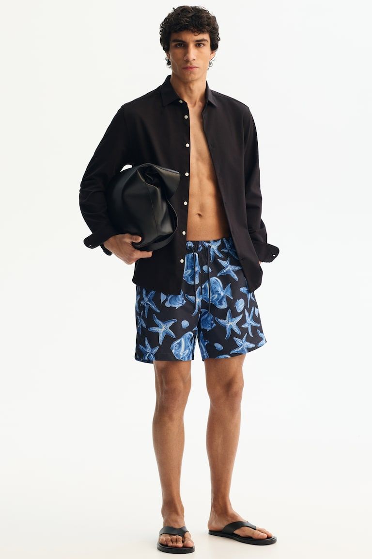 Patterned swim shorts