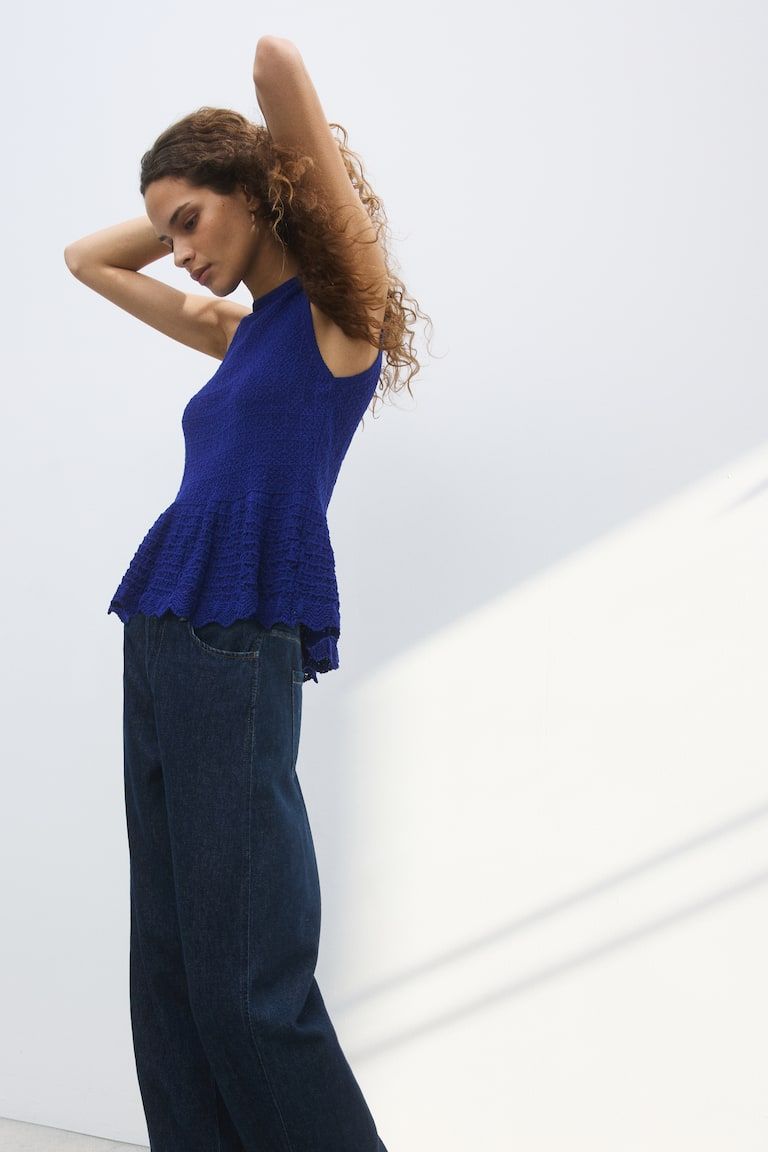 Pointelle-knit peplum top