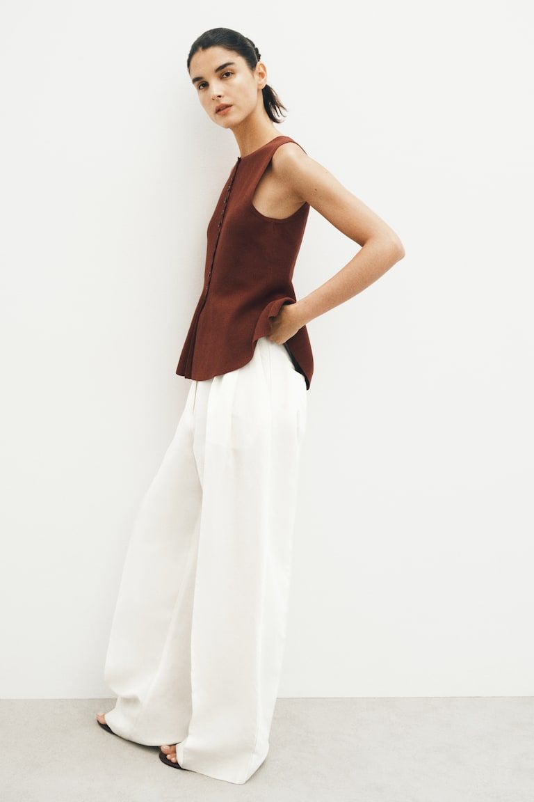 Rib-Knit Peplum Sleeveless Top