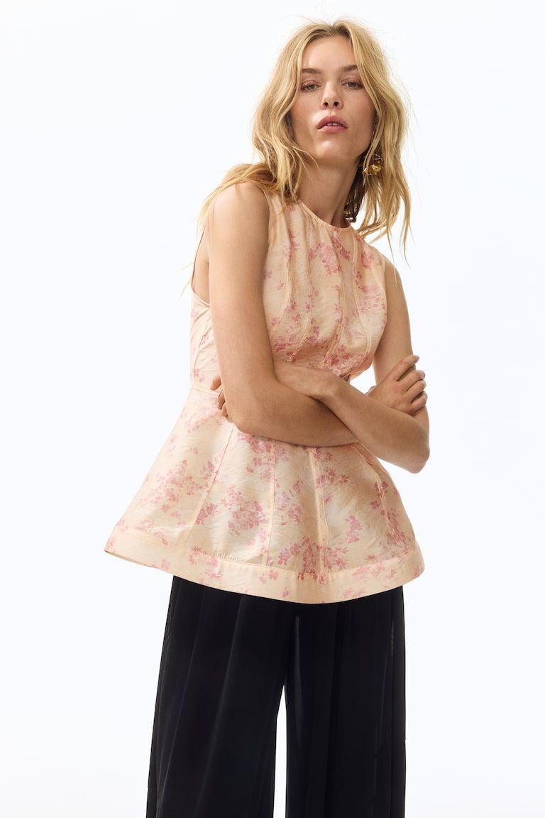 Sleeveless Peplum Top
